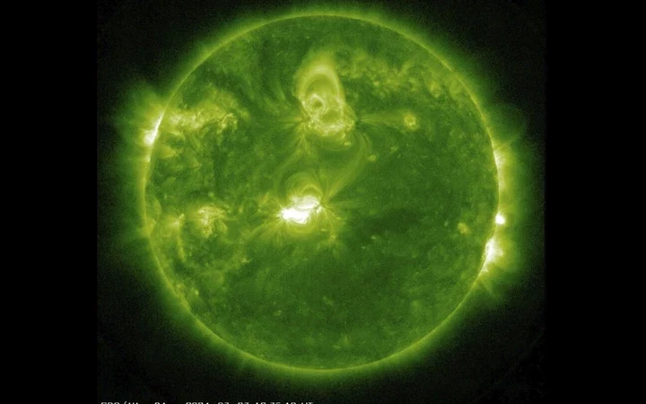 Sun Sparks Chaos: How Solar Flares Shake Up Radio Waves and Paint the Sky