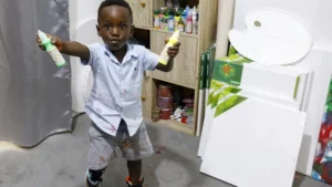 Colorful Prodigy: Ghana's Youngest Male Artist Makes History!